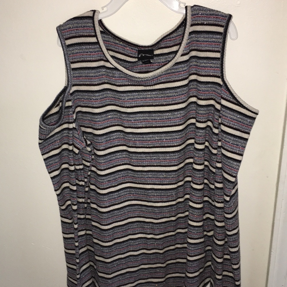 A shoulder less long sleeve shirt